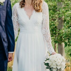 White long sleeve lace open back gown